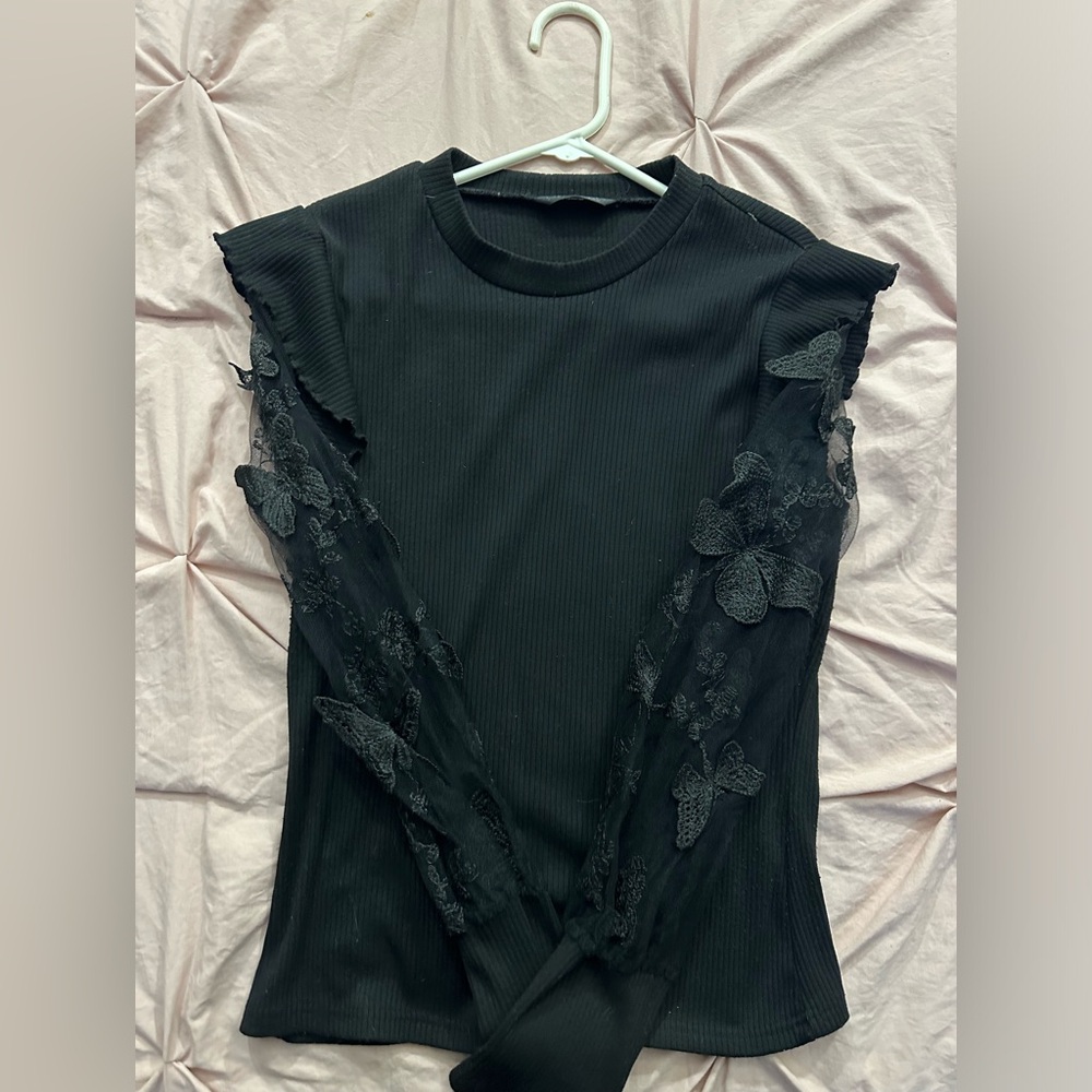 Black Long sleeve, see-through butterfly sleeves.